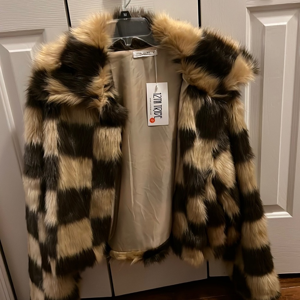 12th tribe coat